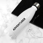 White water bottle with floral design and 'Cunt' text on a marble surface