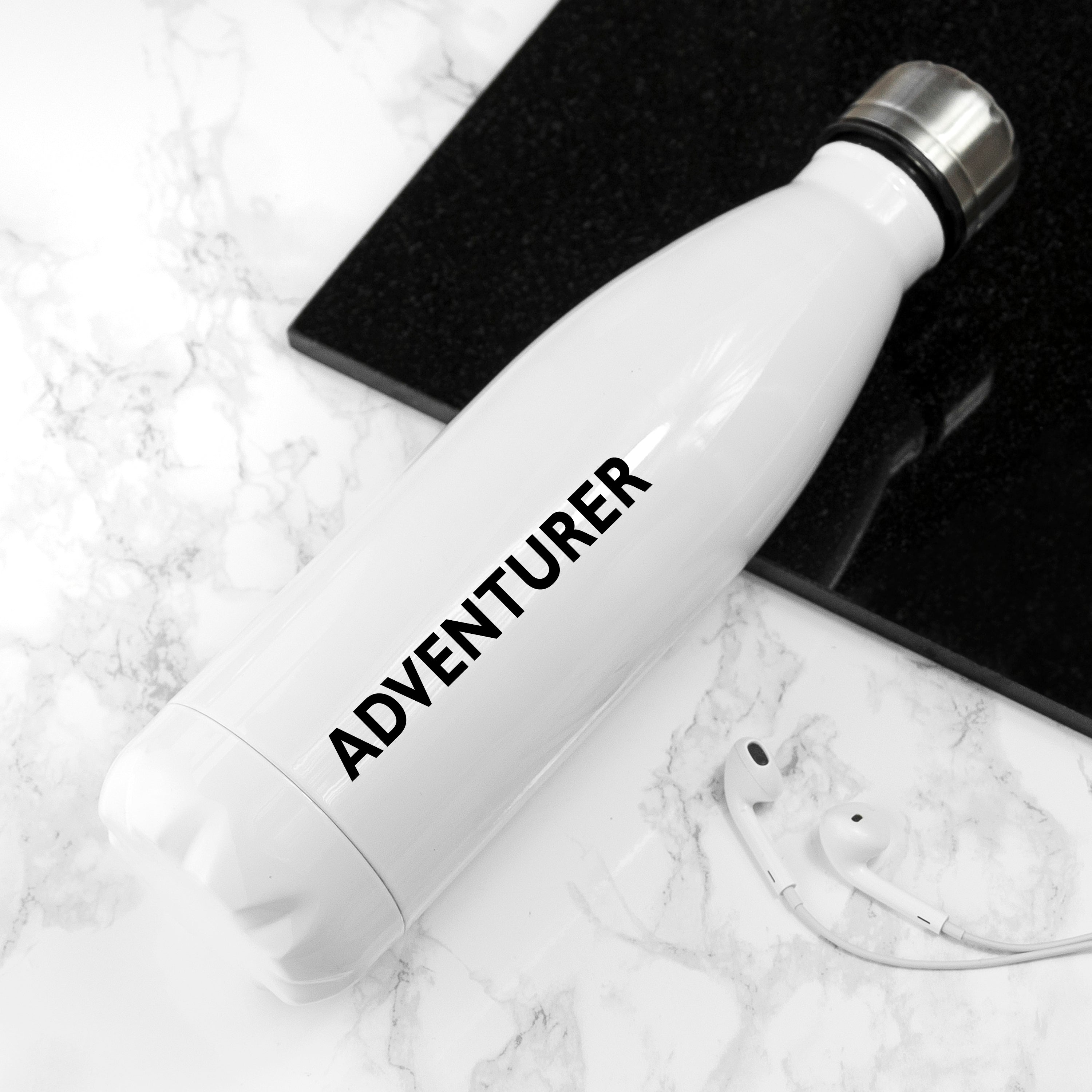 White water bottle with floral design and 'Cunt' text on a marble surface
