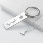 Silver keychain with 'My lucky star' tag and star-shaped pendant on a light background