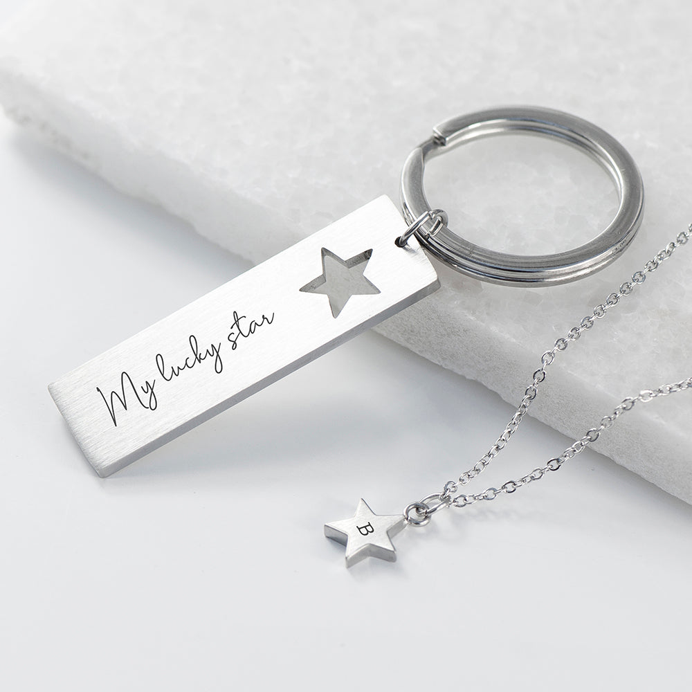 Silver keychain with 'My lucky star' tag and star-shaped pendant on a light background