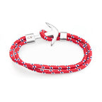 Red braided bracelet with silver anchor clasp on a white background