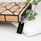 Cork wallet with geometric pattern and 'FREYA' tag on a light background