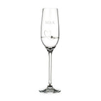 Clear champagne flute with 'M&K' engraving on a white background