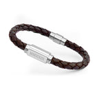 Brown braided leather bracelet with silver clasp on a white background
