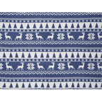 Nordic pattern with deer, trees, and snowflakes on a blue and white background