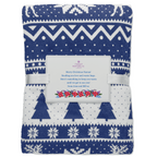 Folded blue and white patterned blanket with a label on a white background