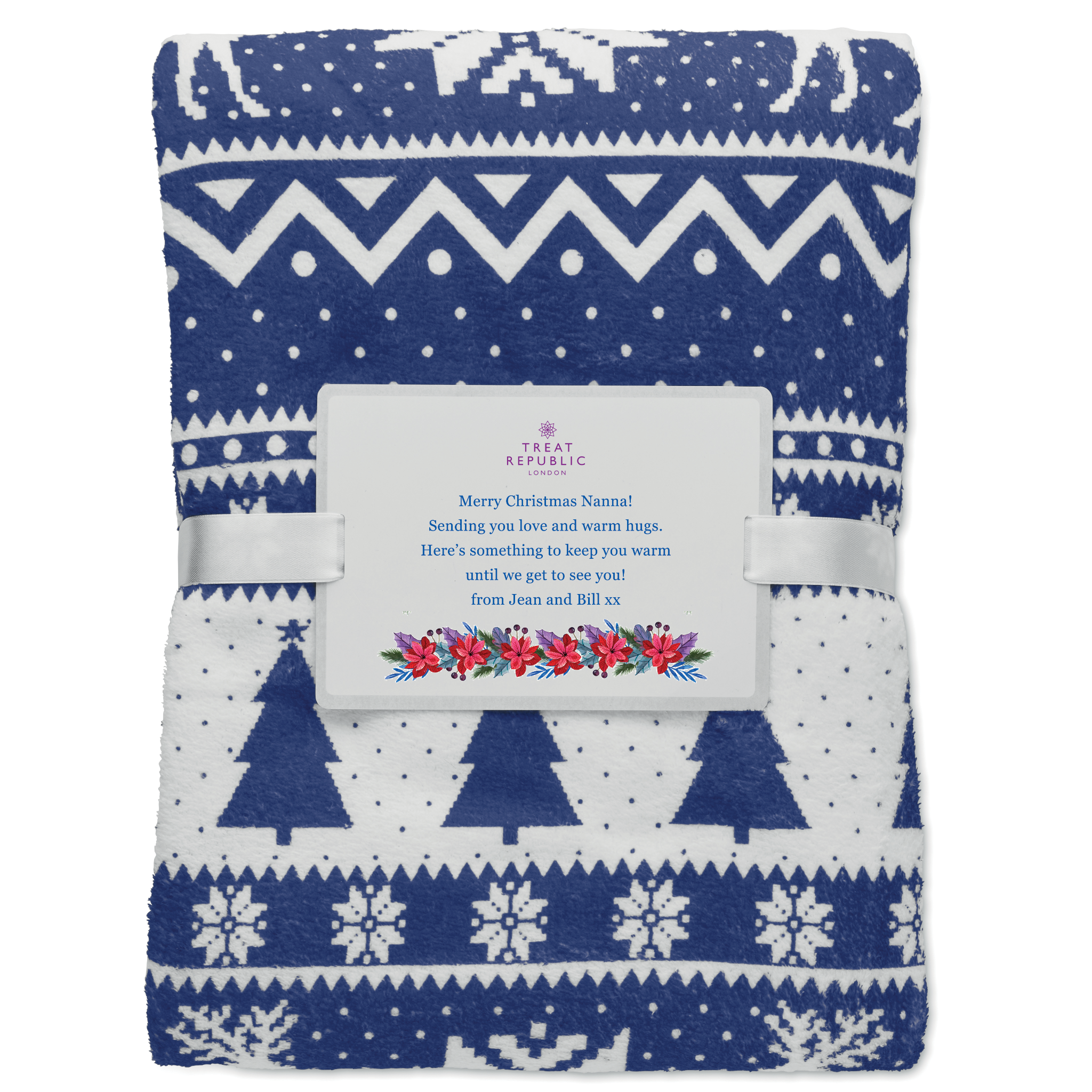 Folded blue and white patterned blanket with a label on a white background