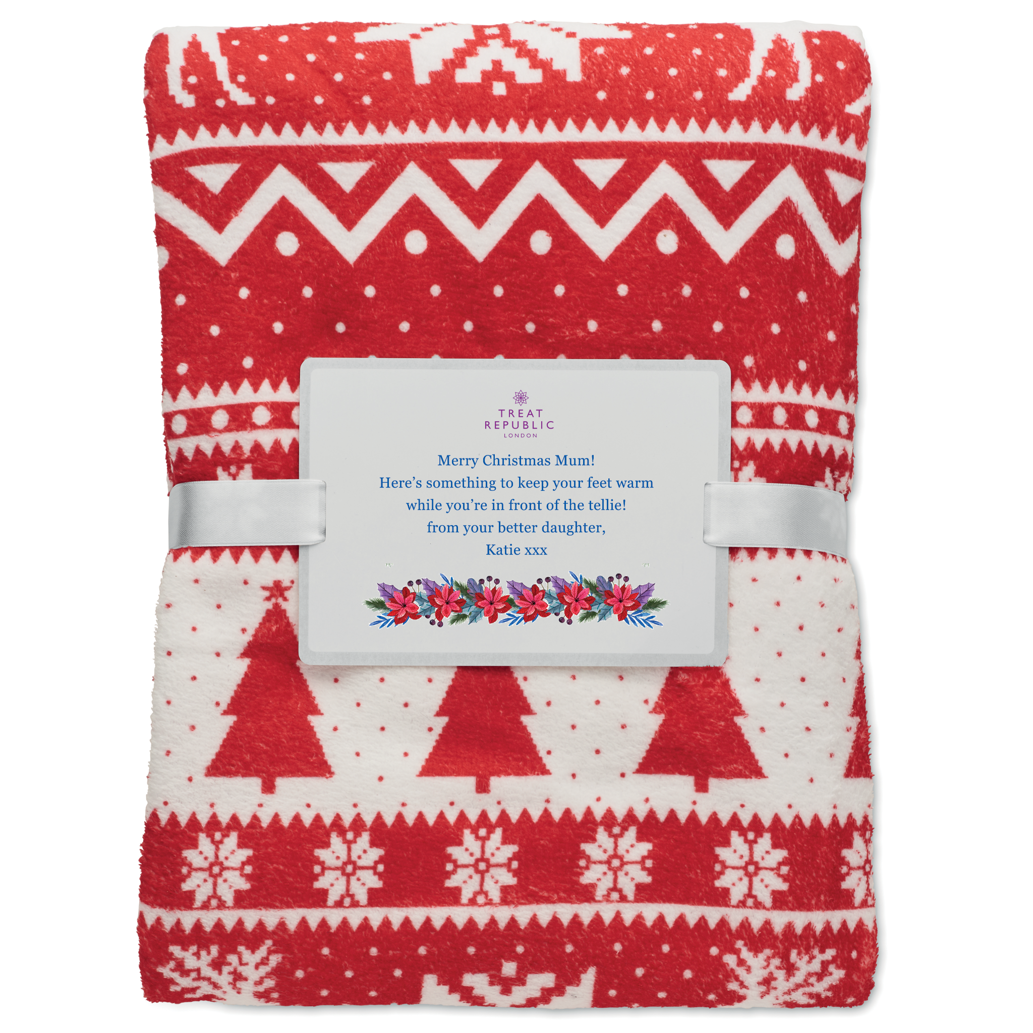 Red and white patterned blanket with a card on a white background