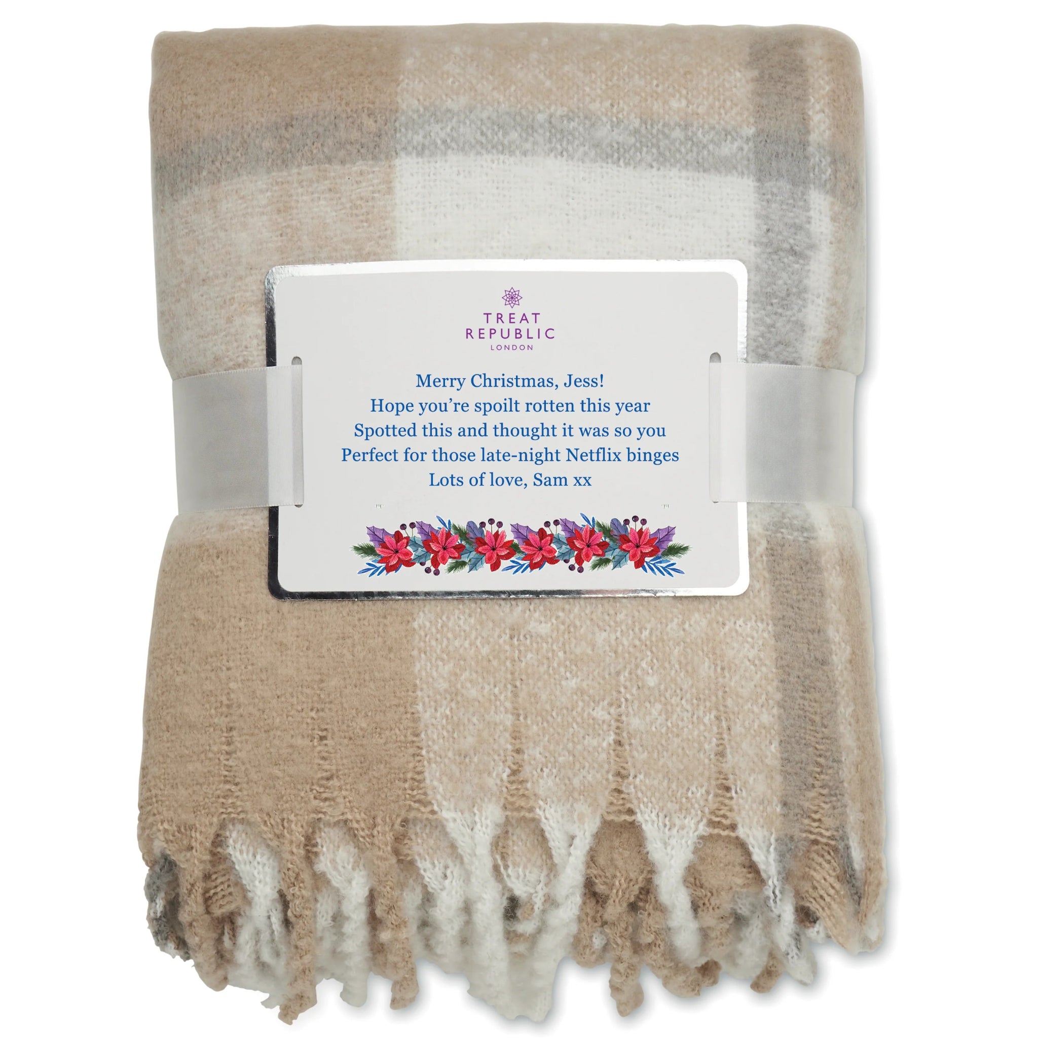 Beige plaid blanket with a personalised message tag on a white background