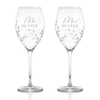 Two wine glasses with 'Mr Hunter' and 'Mrs Hunter' engraving on a white background