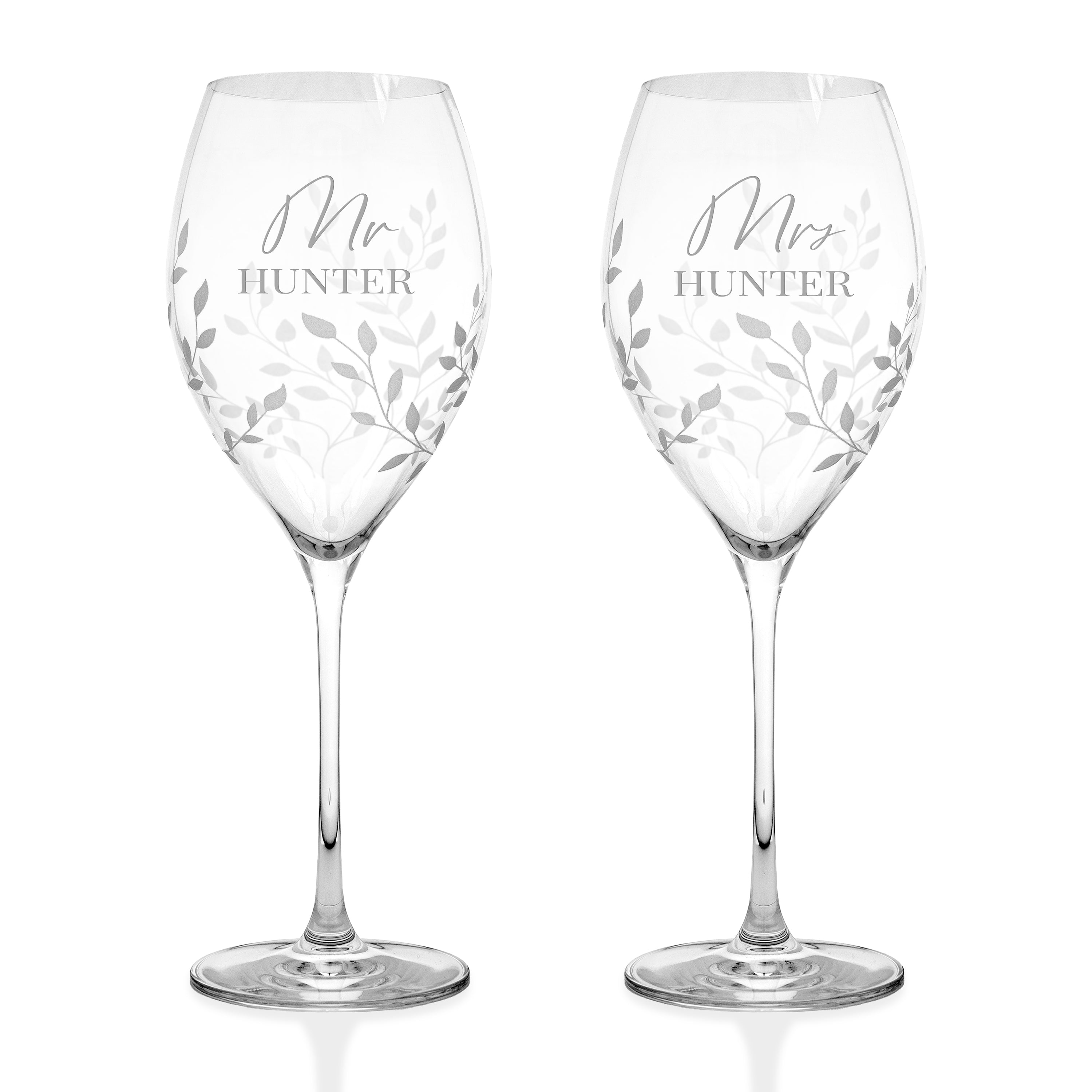 Two wine glasses with 'Mr Hunter' and 'Mrs Hunter' engraving on a white background