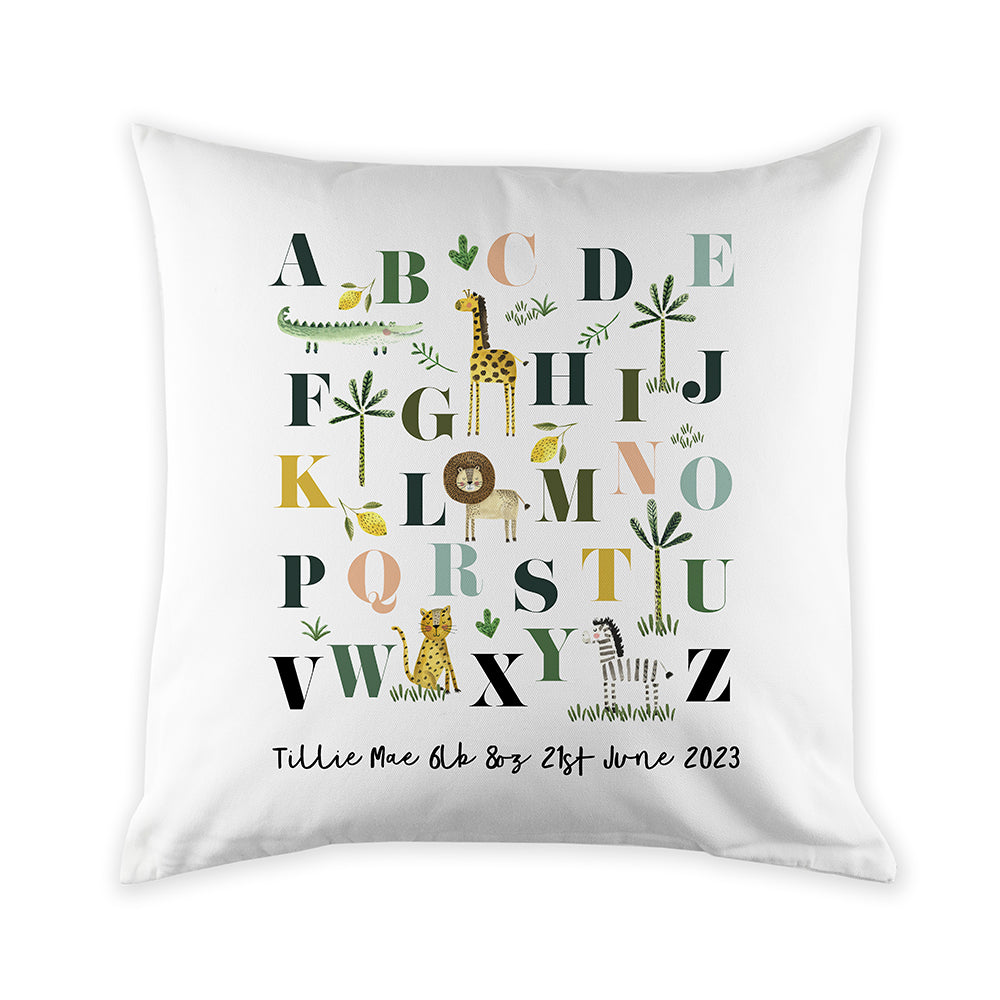 White pillow with colorful alphabet letters and animal illustrations on a white background