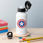 White water bottle with Captain America shield design on a wooden surface with books and pencils.