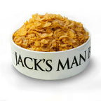White bowl with 'Jack's Man' text filled with cornflakes on a white background