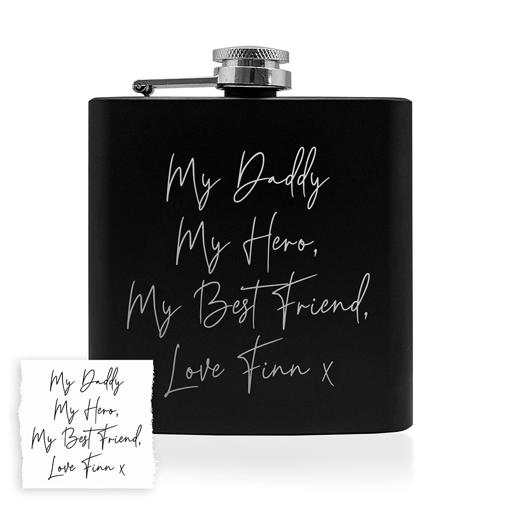 Black flask with engraved text on a white background