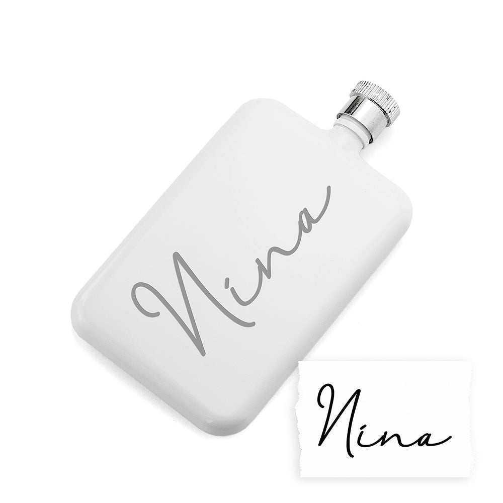 White flask with 'Nina' engraving on a white background