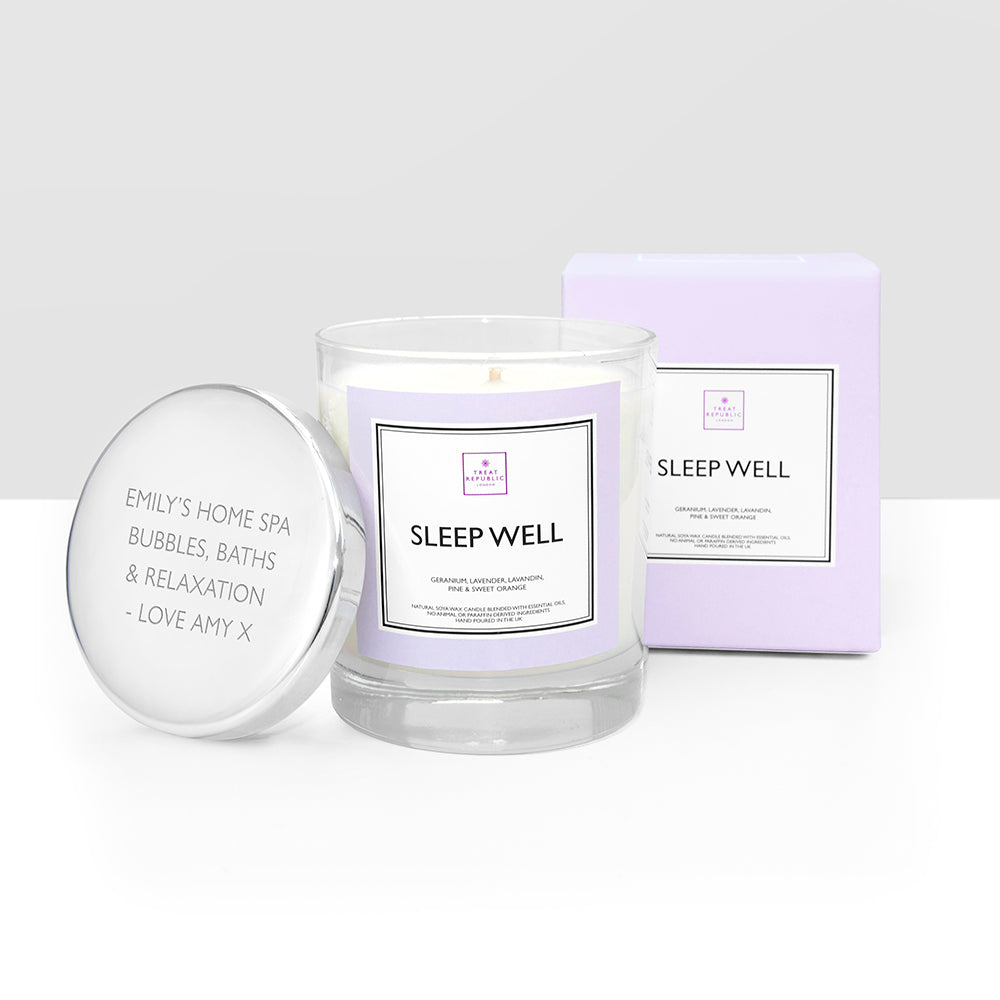 Candle labeled 'Sleep Well' with packaging on a white background