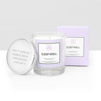 Candle labeled 'Sleep Well' with packaging on a white background