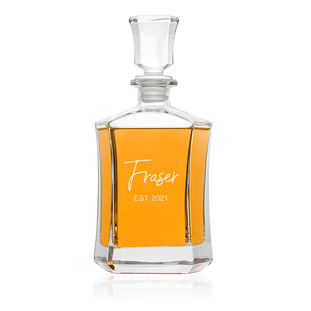 Clear glass decanter with 'Fraser EST. 2021' engraving on a white background