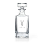Clear glass decanter with 'Wallace' branding on a white background