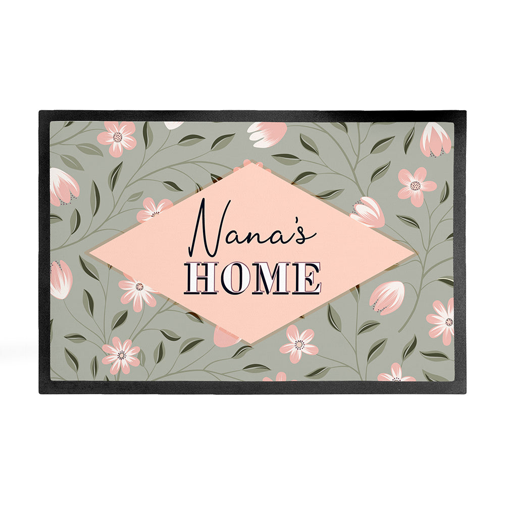 Decorative mat with floral pattern and 'Nana's Home' text on a white background
