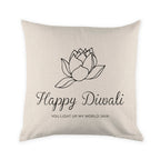Decorative pillow with a lotus design and 'Happy Diwali' text on a beige background