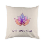 Beige pillow with a logo and 'Ashton's Seat' text on a white background