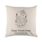 Decorative pillow with Ganesha design and 'Happy Diwali Prapti' text on a beige background