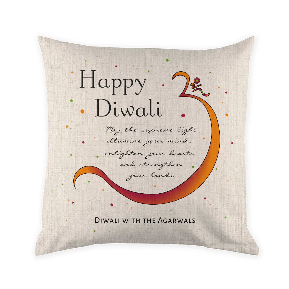 Decorative pillow with 'Happy Diwali' text and design on a white background