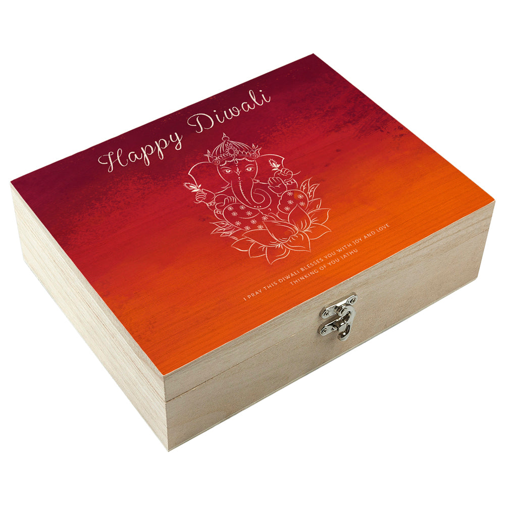 Wooden box with 'Happy Diwali' and Ganesha design on a white background
