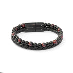 Black braided leather and beaded bracelet with a metal clasp on a white background