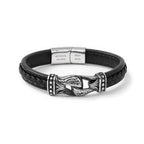 Black leather bracelet with silver clasp and engraved tag on a white background