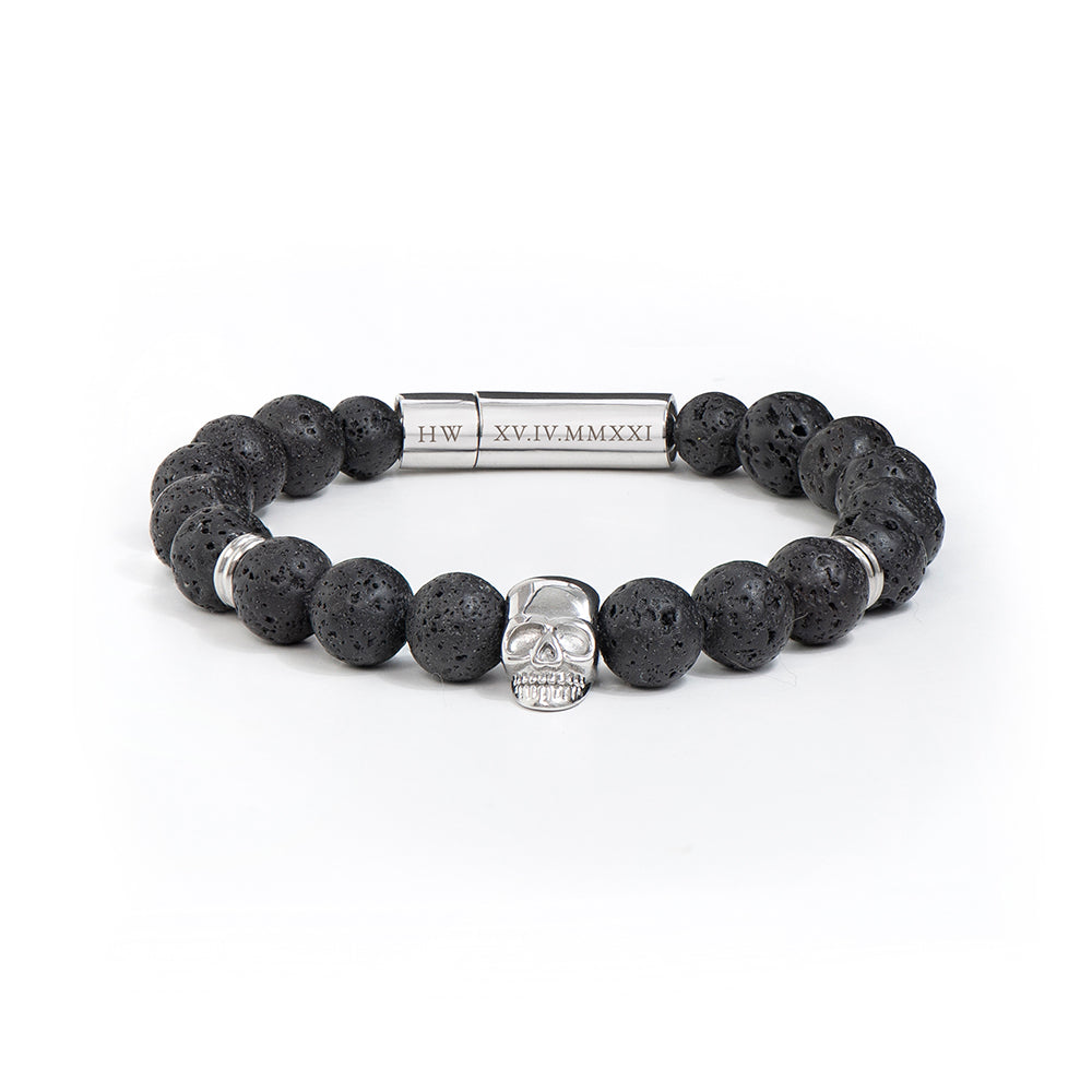 Black beaded bracelet with a skull charm on a white background