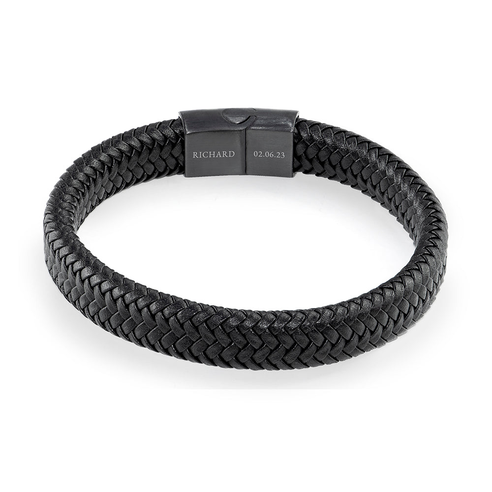 Black braided bracelet with a clasp on a white background