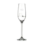 Clear glass flute with 'SG' initials and heart design on a white background