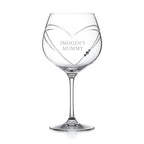 Clear wine glass with 'IMOGEN'S MUMMY' engraving on a white background