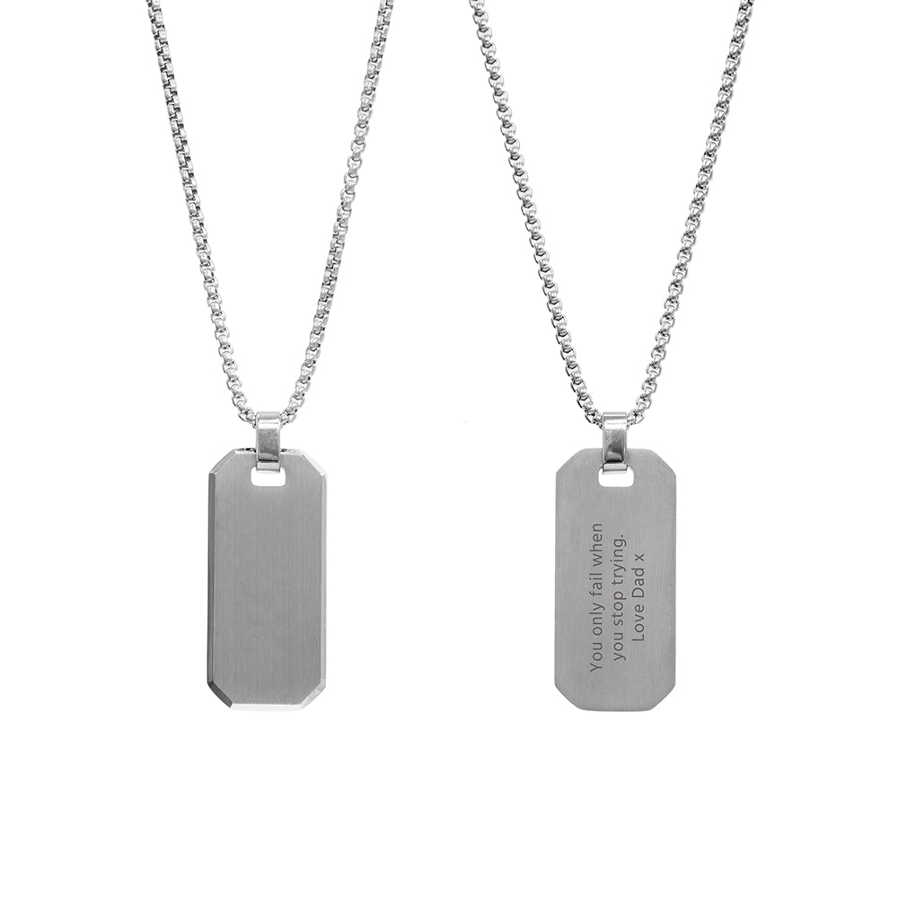 Two silver dog tag necklaces on white background
