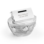 Silver baby bootie box with a card inside on a white background