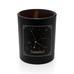 Black candle holder with star constellation design and 'Annabel' text on a white background