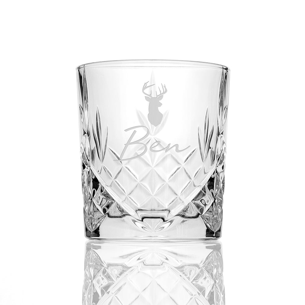 Clear glass with engraved design and 'Ben' text on a white background
