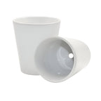 Two white ceramic cups on a white background