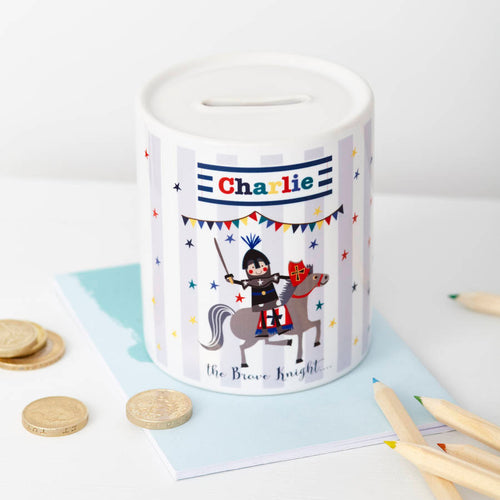 Children's money box with a knight design and 'Charlie' on a white background