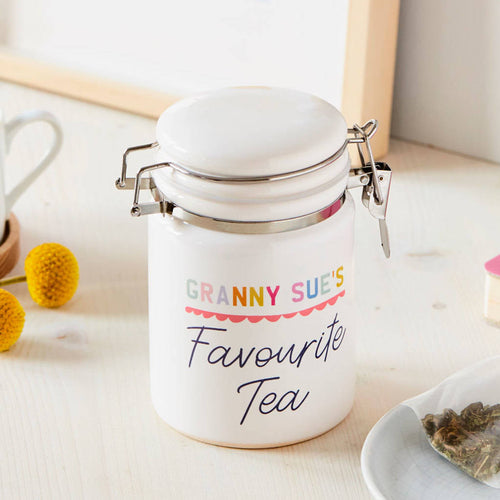 White ceramic jar with 'Granny Sue's Favourite Coffee' text on a light background