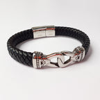 Black braided leather bracelet with a silver clasp on a white background