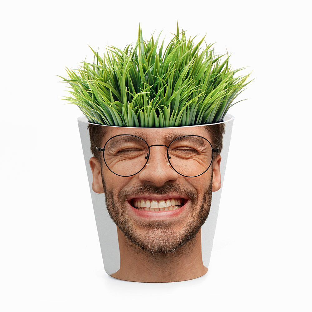 Potted plant shaped like a smiling face with glasses