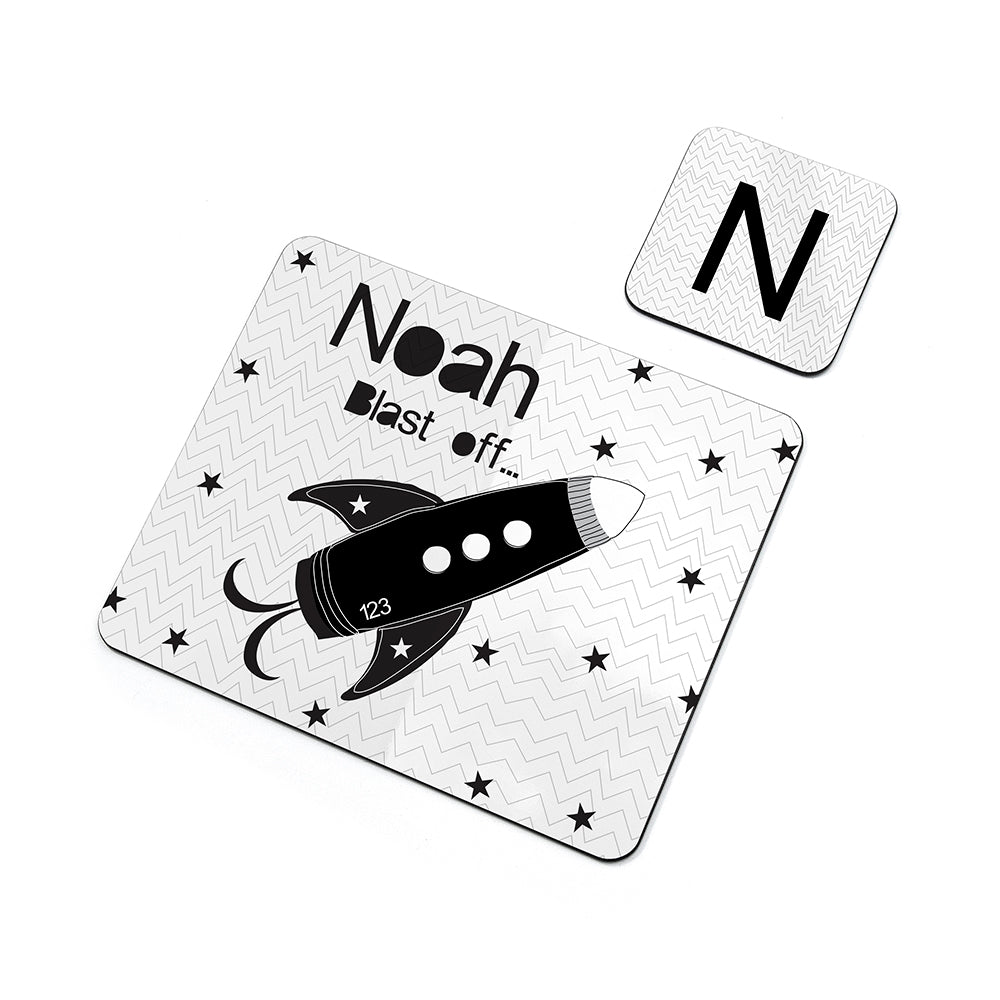 Personalized children's placemat with rocket design and name 'Noah' on a white background