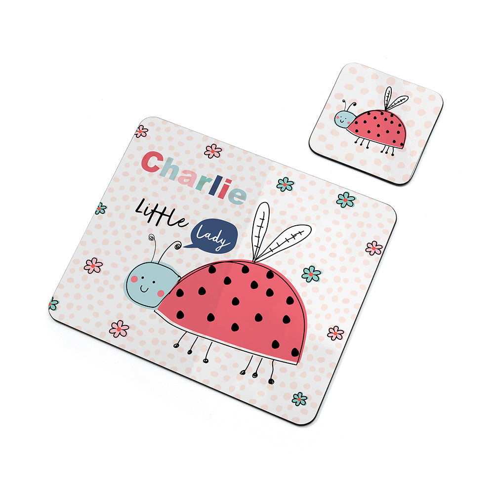 Placemat with cartoon ladybug design and matching coaster on a white background