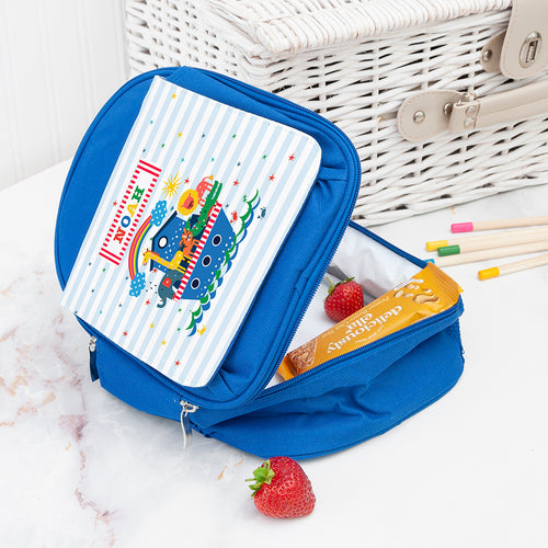 Blue lunch bag with cartoon design on a white surface