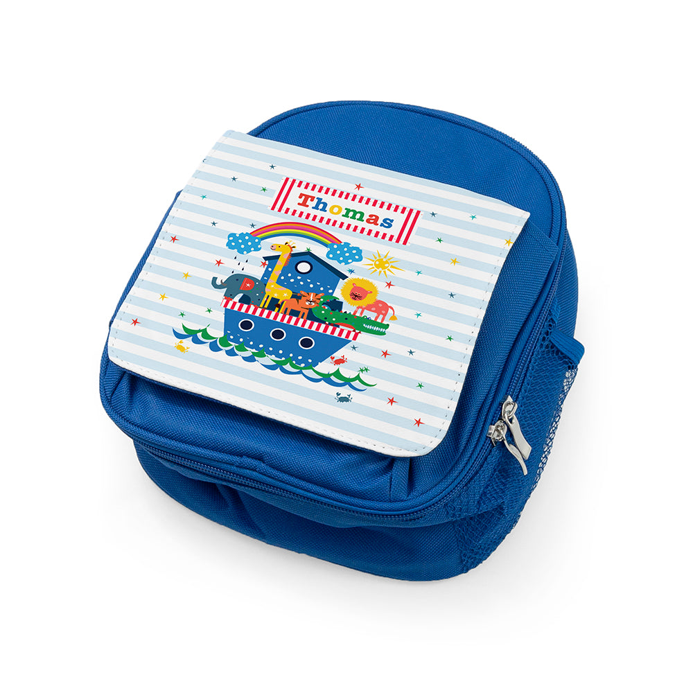 Blue children's backpack with a colorful front panel featuring cartoon characters and the name 'Thomas'.